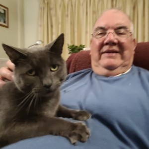 “I was shocked when I checked my bank account to discover £200 deposited that was unexpected. My cat Biscuit and I appreciate your work.” Warren Baker with his cat Biscuit – £200 Weekly Lottery winner